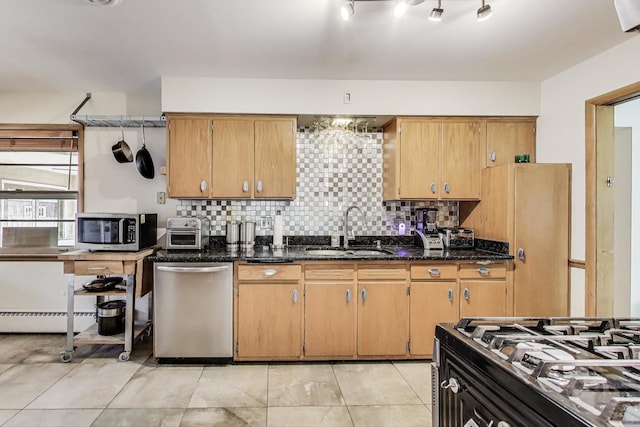 929 N Delphia Ave, Park Ridge, IL 60068 - kitchen featuring a sink, appliances with stainless steel finishes, backsplash, and baseboard heating