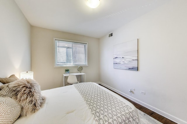 2303 W Chicago Ave Unit 2, Chicago, IL 60622 - bedroom with wood finished floors and baseboards