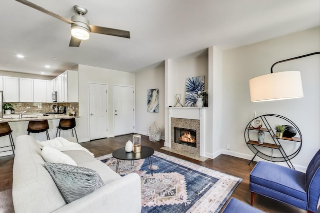 2303 W Chicago Ave Unit 2, Chicago, IL 60622 - living room with ceiling fan, dark wood-style flooring, a fireplace with flush hearth, baseboards, and recessed lighting