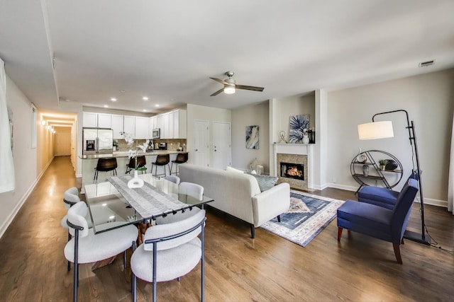 2303 W Chicago Ave Unit 2, Chicago, IL 60622 - living area featuring baseboards, wood finished floors, ceiling fan, a lit fireplace, and recessed lighting