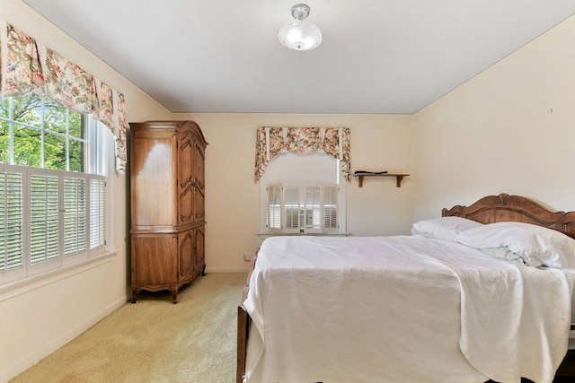 317 Blackhawk Rd, Riverside, IL 60546 - bedroom featuring light carpet, baseboards, and lofted ceiling
