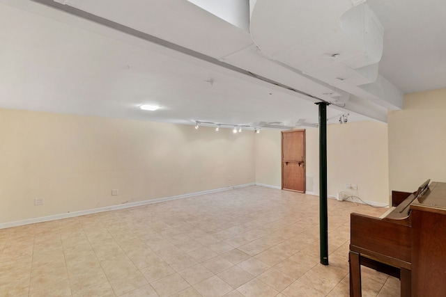 317 Blackhawk Rd, Riverside, IL 60546 - finished basement with light tile patterned floors and baseboards