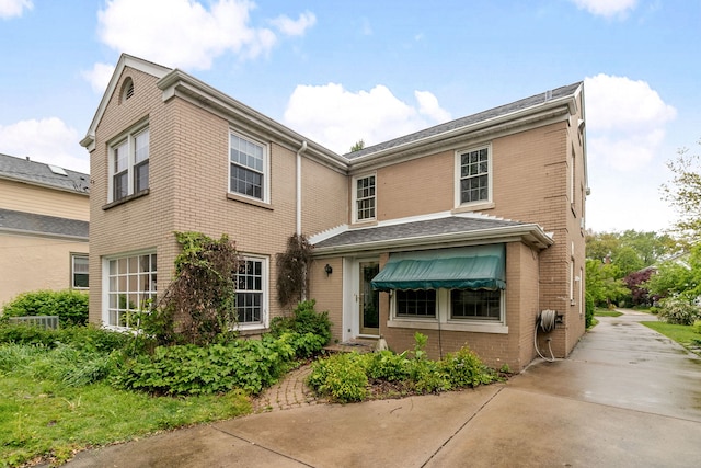 317 Blackhawk Rd, Riverside, IL 60546 - view of front facade with brick siding and driveway
