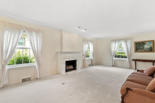 317 Blackhawk Rd, Riverside, IL 60546 - carpeted living area featuring a fireplace, crown molding, and baseboards