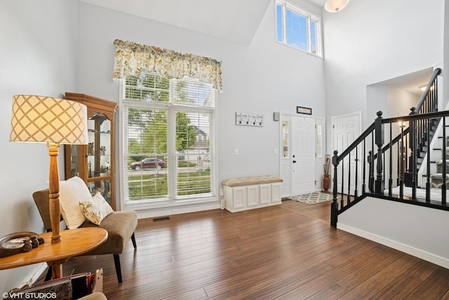 39W326 W Mallory Dr, Geneva, IL 60134 - foyer entrance with a high ceiling, stairway, wood-type flooring, and baseboards