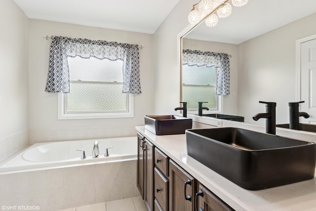 39W326 W Mallory Dr, Geneva, IL 60134 - bathroom featuring a bath, double vanity, and tile patterned flooring