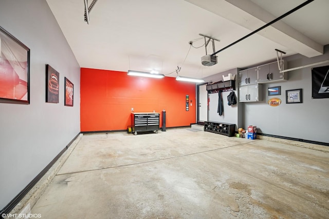 39W326 W Mallory Dr, Geneva, IL 60134 - garage featuring a garage door opener and baseboards