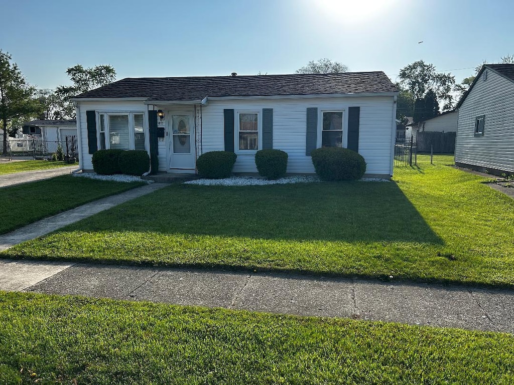 411 Kenyon Ave, Romeoville, IL 60446 - view of front of property with roof with shingles