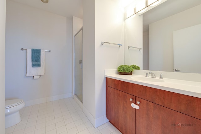 565 W Quincy St Unit 1206, Chicago, IL 60661 - bathroom featuring toilet, a shower stall, vanity, and tile patterned floors