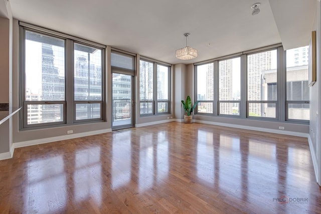 565 W Quincy St Unit 1206, Chicago, IL 60661 - unfurnished sunroom featuring plenty of natural light