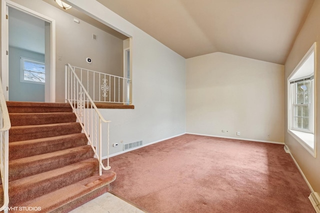 1092 Aberdeen Ln, Mundelein, IL 60060 - staircase featuring carpet flooring, vaulted ceiling, and baseboards