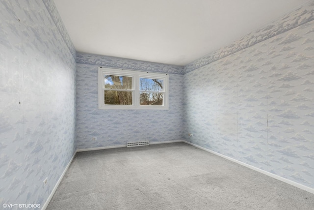 1092 Aberdeen Ln, Mundelein, IL 60060 - carpeted empty room with baseboards and wallpapered walls