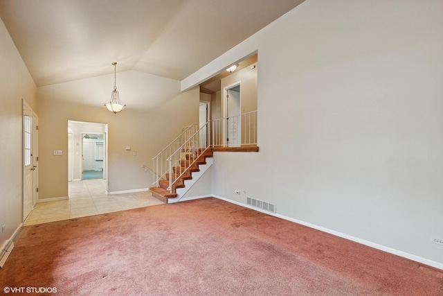 1092 Aberdeen Ln, Mundelein, IL 60060 - foyer featuring light colored carpet, vaulted ceiling, stairway, and baseboards