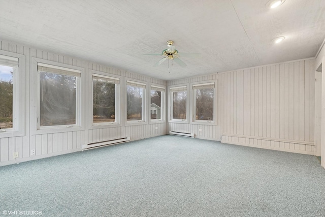 1092 Aberdeen Ln, Mundelein, IL 60060 - unfurnished sunroom featuring a ceiling fan, baseboard heating, and healthy amount of natural light