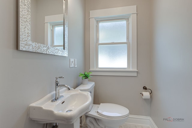 842 Mapleton Ave, Oak Park, IL 60302 - half bathroom with toilet, a sink, and baseboards