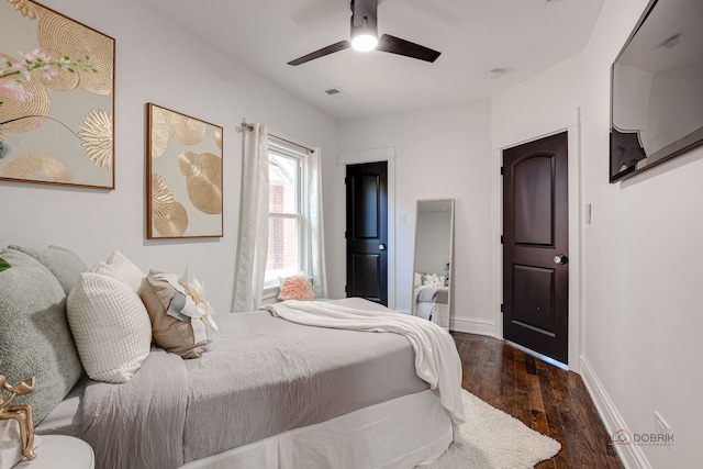 842 Mapleton Ave, Oak Park, IL 60302 - bedroom with dark wood-style floors, baseboards, and a ceiling fan
