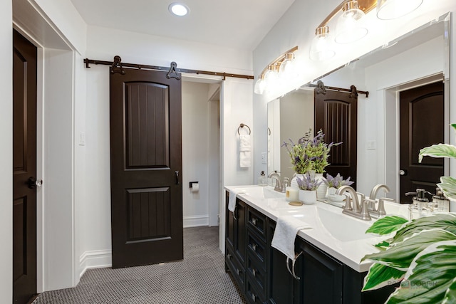 842 Mapleton Ave, Oak Park, IL 60302 - bathroom with double vanity, recessed lighting, and baseboards
