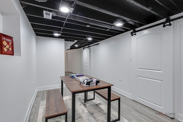 842 Mapleton Ave, Oak Park, IL 60302 - finished basement featuring light wood-style flooring and baseboards