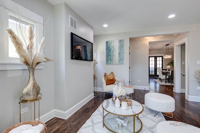 842 Mapleton Ave, Oak Park, IL 60302 - living room featuring wood finished floors, baseboards, a chandelier, and recessed lighting