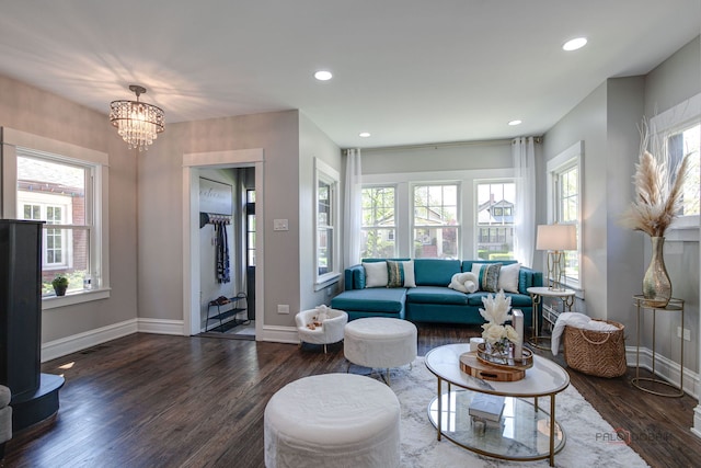 842 Mapleton Ave, Oak Park, IL 60302 - living room with wood finished floors, a chandelier, baseboards, and recessed lighting