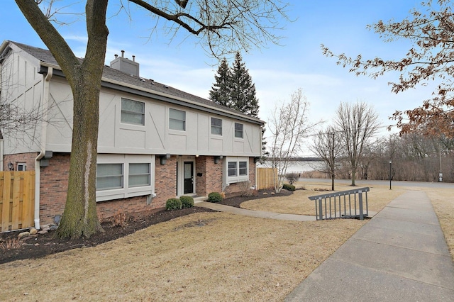 886 Bristol Dr, Barrington, IL 60010 - view of front facade featuring brick siding, a chimney, and roof with shingles