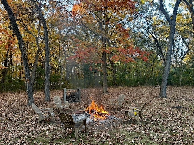 10081 Haas Rd, Rockton, IL 61072 - view of yard featuring an outdoor fire pit