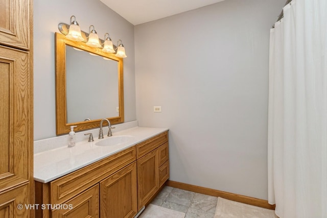 38695 N Shagbark Ln, Wadsworth, IL 60083 - bathroom with vanity and baseboards