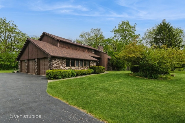 38695 N Shagbark Ln, Wadsworth, IL 60083 - view of property exterior featuring a lawn and a chimney