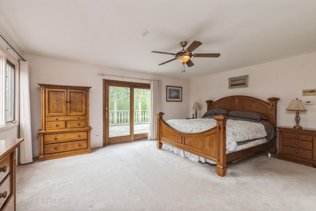 38695 N Shagbark Ln, Wadsworth, IL 60083 - bedroom with access to exterior, light carpet, and a ceiling fan