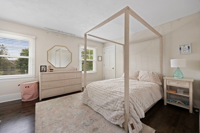 2215 Barger Ct, Wheaton, IL 60189 - bedroom with dark wood finished floors and baseboards