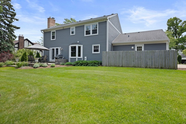 2215 Barger Ct, Wheaton, IL 60189 - rear view of house featuring a chimney and a patio