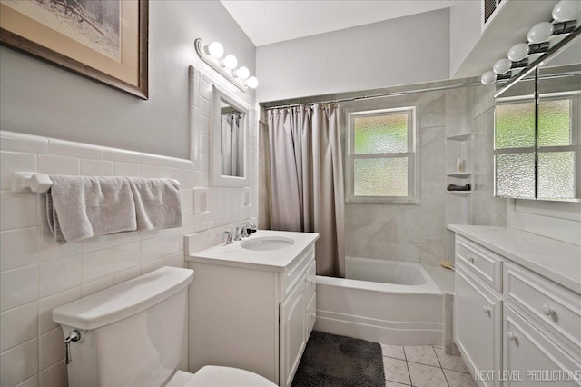 1731 Garfield Ave, Aurora, IL 60506 - bathroom with toilet, shower / bath combo, tile walls, and vanity