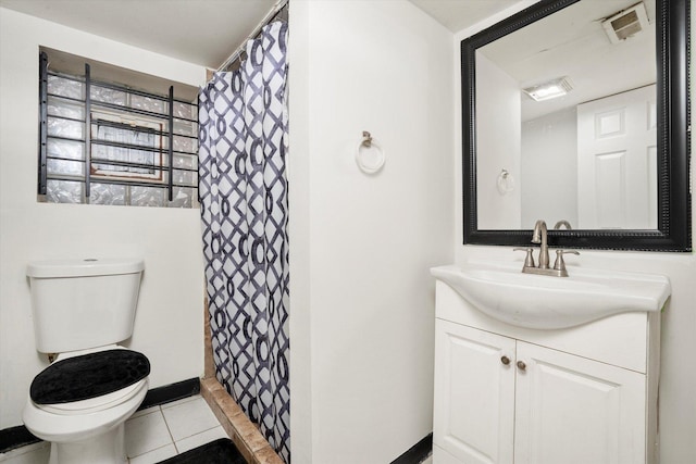 full bath with vanity, tile patterned floors, and a shower with curtain