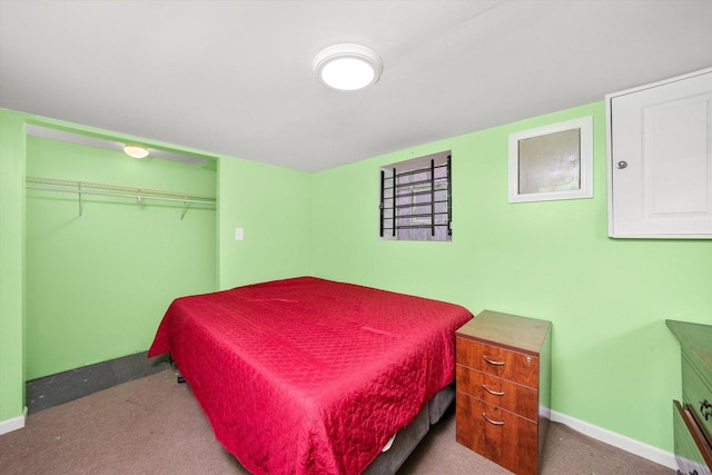 carpeted bedroom with a closet and billiards