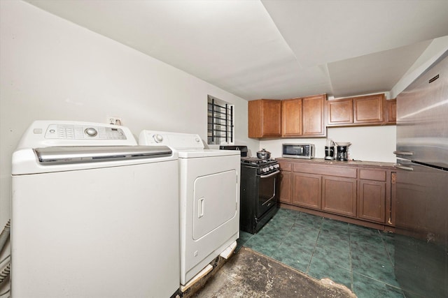 laundry area with washer and dryer