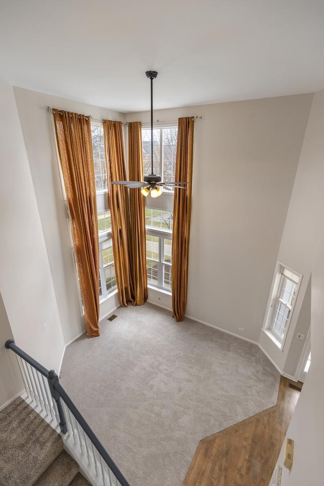119 Allerton Dr, Schaumburg, IL 60194 - staircase with baseboards, plenty of natural light, and carpet