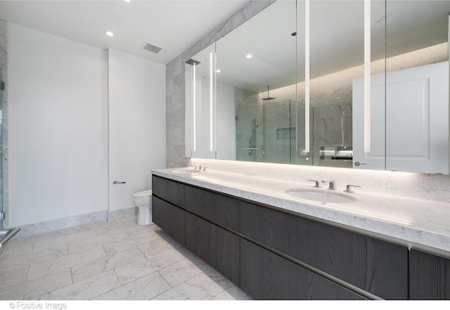 363 E Wacker Dr Unit 1903, Chicago, IL 60601 - bathroom featuring a stall shower, marble look tiles, toilet, double vanity, and recessed lighting