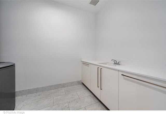 363 E Wacker Dr Unit 1903, Chicago, IL 60601 - laundry room with a sink and baseboards