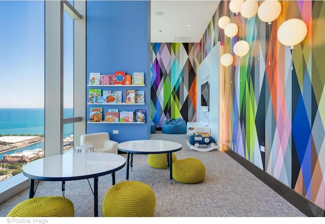 363 E Wacker Dr Unit 1903, Chicago, IL 60601 - recreation room featuring wallpapered walls, a water view, and carpet floors