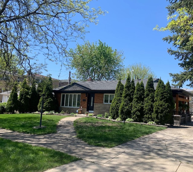 8632 New England Ave, Burbank, IL 60459 - single story home with a front yard and stone siding