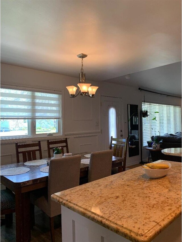 8632 New England Ave, Burbank, IL 60459 - dining area with a chandelier
