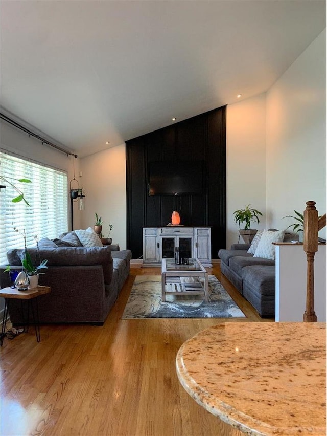 8632 New England Ave, Burbank, IL 60459 - living room with wood finished floors and vaulted ceiling