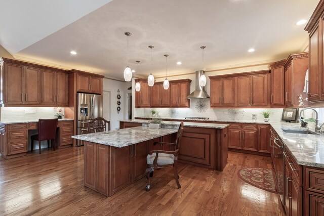 5419 Rita Ave, Crystal Lake, IL 60014 - kitchen with wall chimney range hood, a sink, a kitchen island, stainless steel appliances, and tasteful backsplash