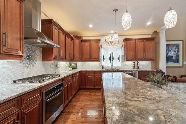 5419 Rita Ave, Crystal Lake, IL 60014 - kitchen with stainless steel appliances, wall chimney range hood, light stone countertops, hanging light fixtures, and recessed lighting