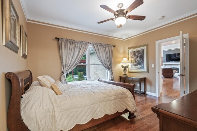 5419 Rita Ave, Crystal Lake, IL 60014 - bedroom featuring ornamental molding, dark wood-style floors, baseboards, and ceiling fan