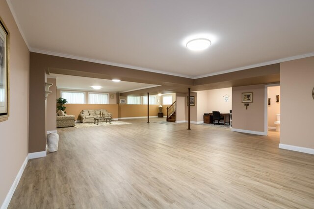 5419 Rita Ave, Crystal Lake, IL 60014 - unfurnished living room with light wood-style floors, stairs, crown molding, and baseboards