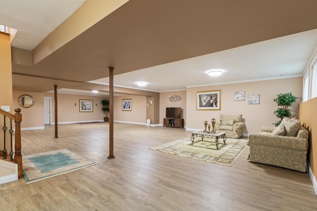 5419 Rita Ave, Crystal Lake, IL 60014 - living area with wood finished floors, ornamental molding, baseboards, and stairs