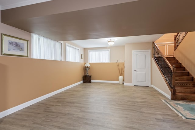 5419 Rita Ave, Crystal Lake, IL 60014 - basement featuring wood finished floors, baseboards, and stairway