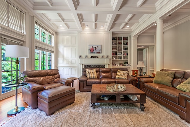 9430 Reserve Dr, Caledonia, IL 61011 - living room featuring ornamental molding, coffered ceiling, built in features, beam ceiling, and decorative columns
