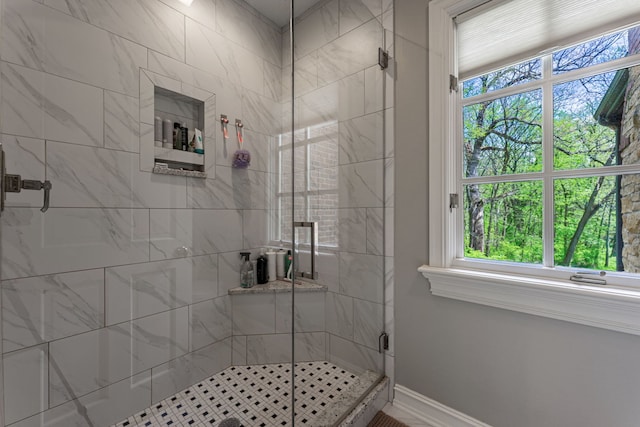 9430 Reserve Dr, Caledonia, IL 61011 - full bath with healthy amount of natural light, a stall shower, and baseboards